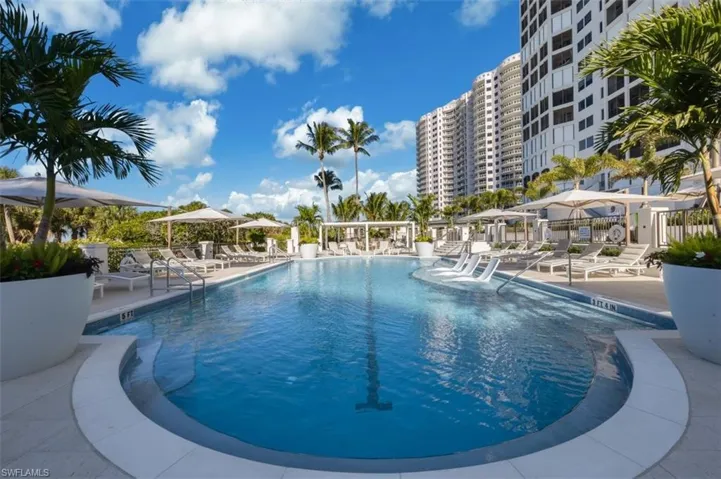 Community pool featuring a patio area