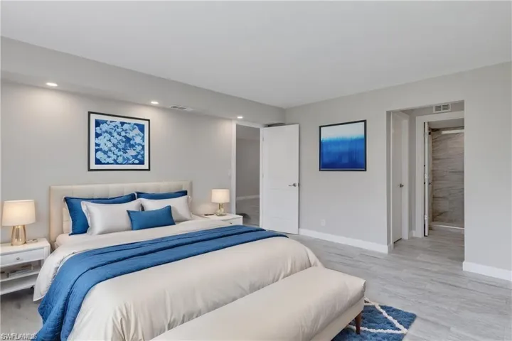 Bedroom with light hardwood / wood-style floors