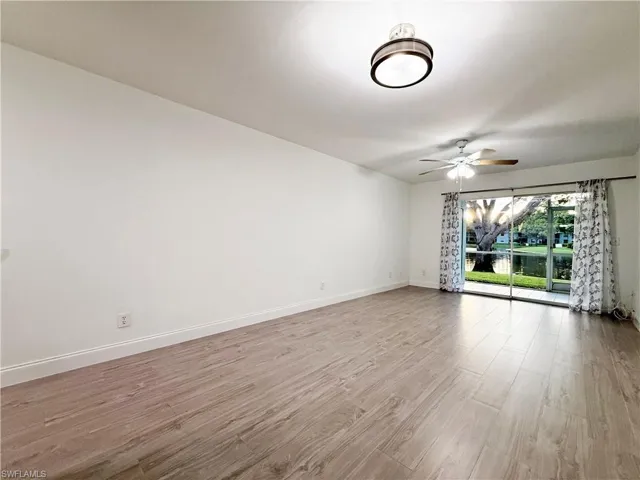 Long Great Room with porcelain, wood textured tile throughout