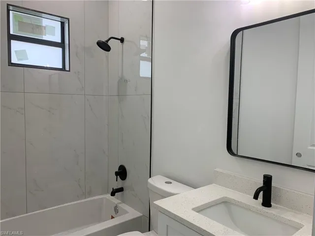 Custom mirror + shower tiling