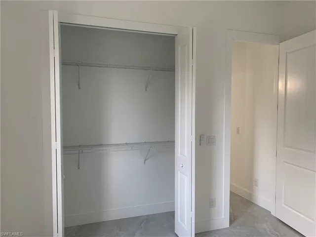 Bedroom closets with custom shelving