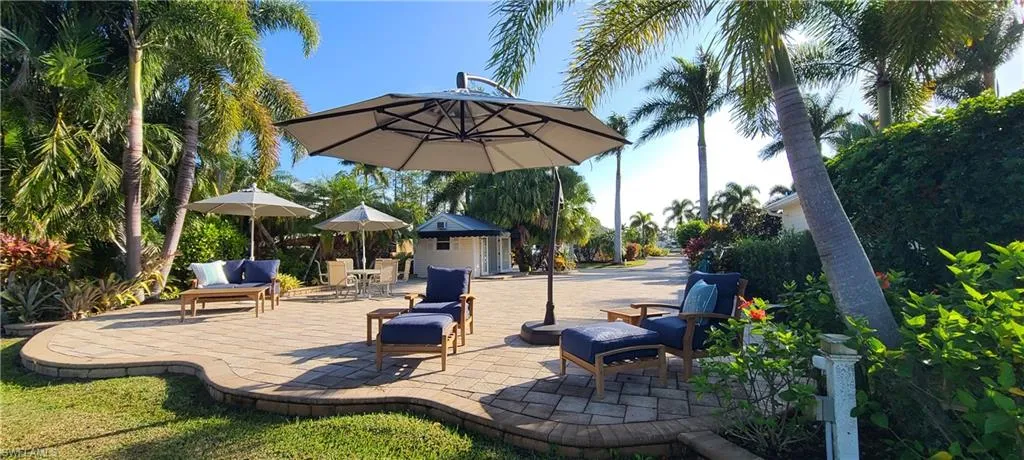 View of patio featuring an outdoor structure