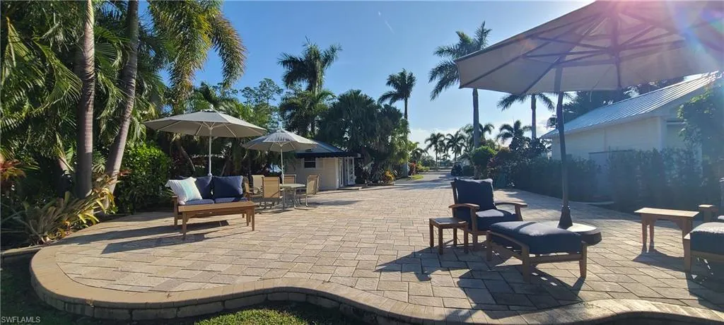 View of patio featuring an outdoor structure