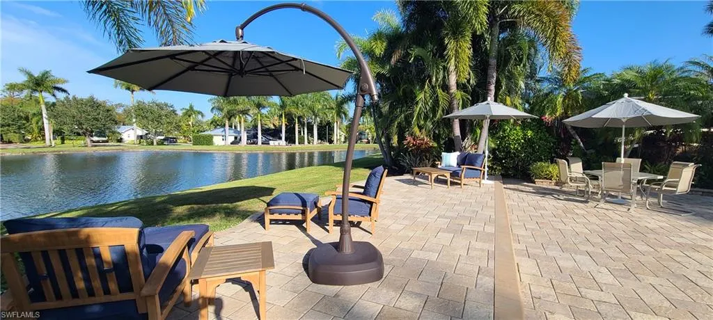 View of patio / terrace featuring a water view