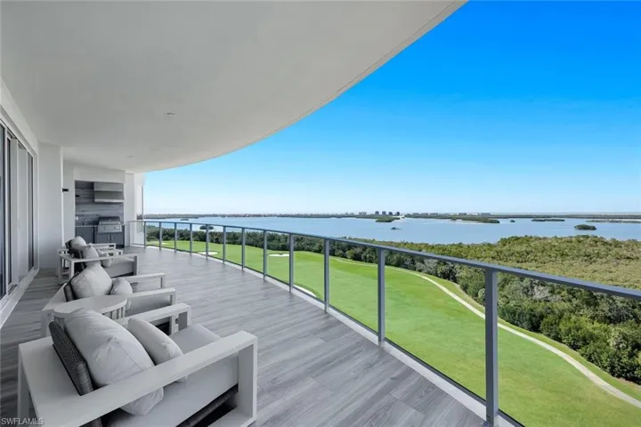 Expansive lanai space with gas grill and sink.