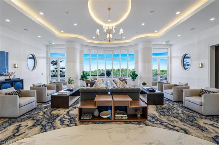 The lobby of the recently constructed Omega condominiums introduces a refined blend of modern design and architectural detail.