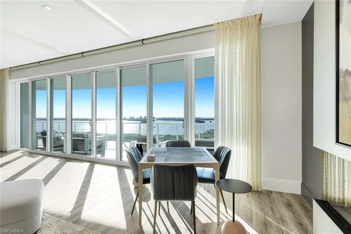 This space is perfect for a family game table  as it captures natural light and outstanding views.