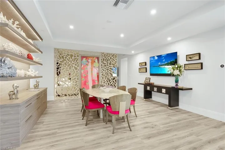One of three distinct dining areas, offering seamless access to the gourmet kitchen.