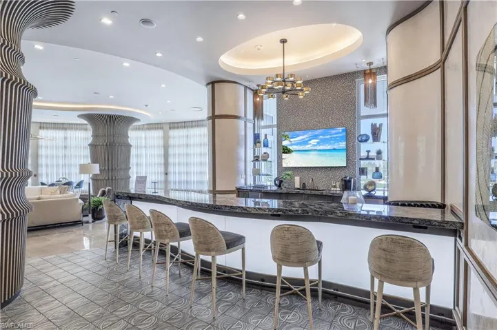 An upscale club room provides a stylish, refined space for entertaining and gathering.