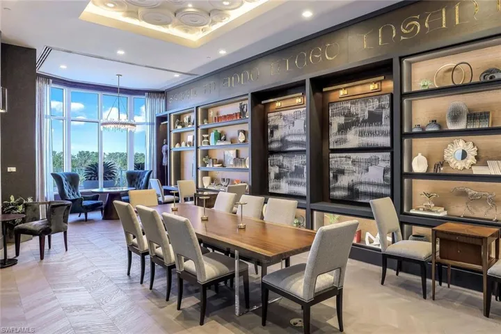 The residents' lounge at Omega offers an elegant gathering space with custom built-ins, designer furnishings, and a refined atmosphere for entertaining guests or connecting with neighbors.