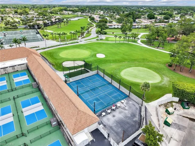 Bird's eye view of a golf club and a nearby body of water