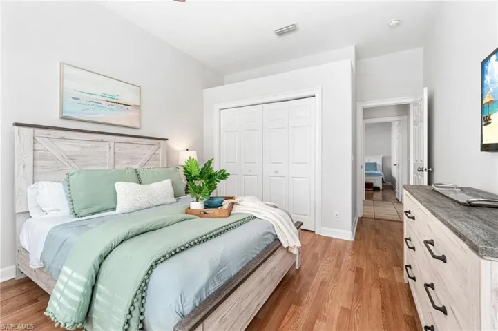 Bedroom featuring a closet and light hardwood / wood-style floors