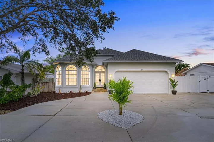 Ranch-style home featuring a garage