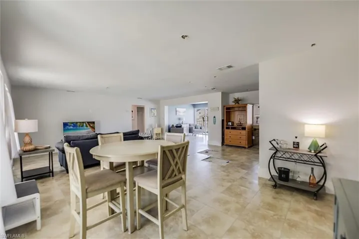 Dining area featuring visible vents