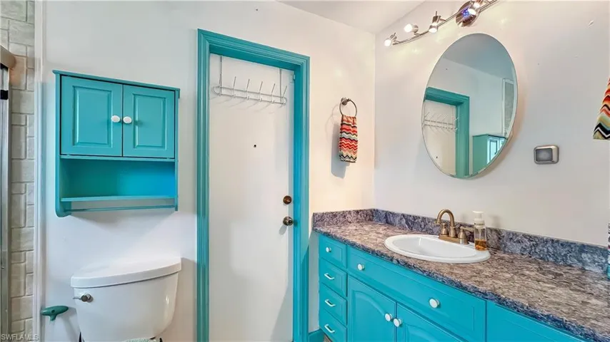 Bathroom with toilet and vanity