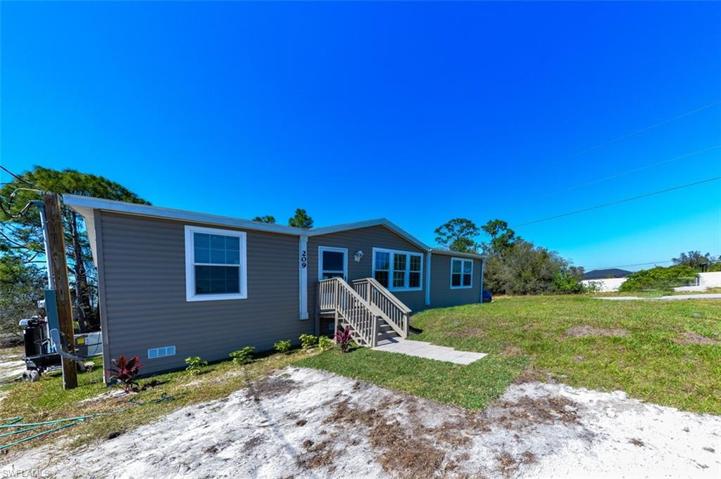 209  Gilbert N AVE, Lehigh Acres, FL 33971