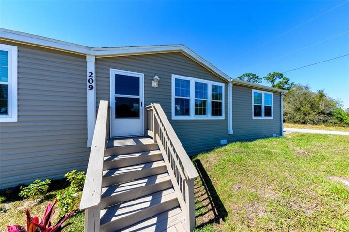 209  Gilbert N AVE, Lehigh Acres, FL 33971