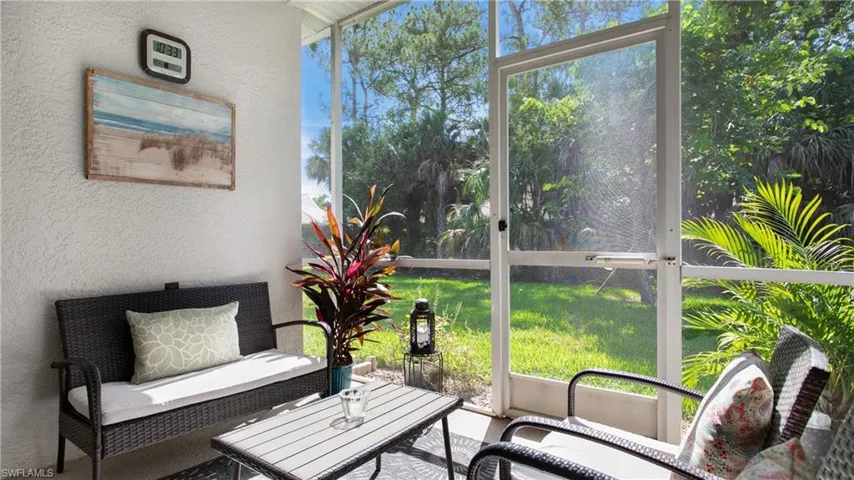 Sunroom with a textured wall