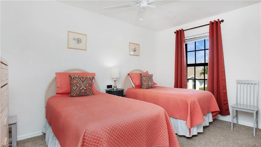 Guest bedroom 2nd floor. Carpeted bedroom with baseboards and ceiling fan