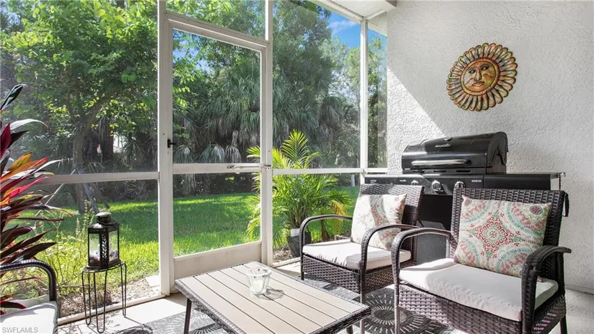 Sunroom with a textured wall