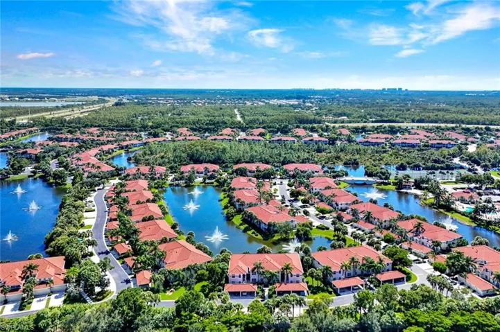 Aerial view of residential area with a nearby body of water