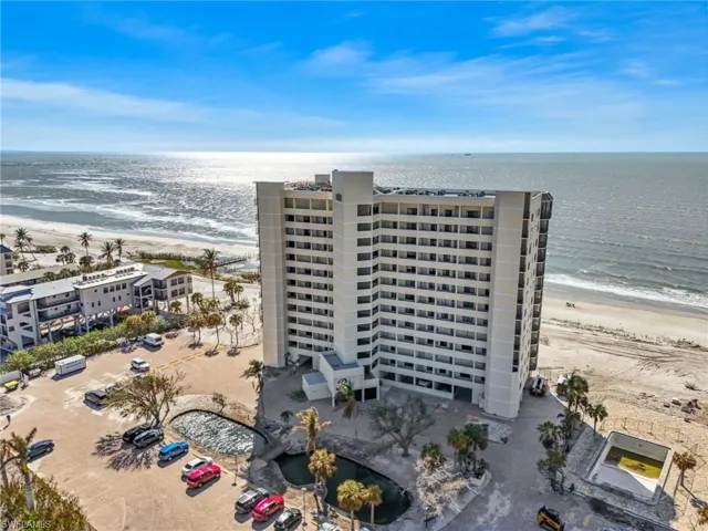 Bird's eye view featuring a view of the beach and a water view