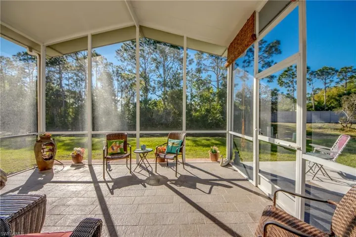 Under roof screened  + tiled Lanai.