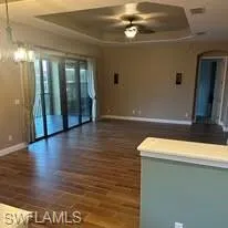 Livingroom is renovated with new wood grain tile. Prentiss Pointe Condo for sale in Fort Myers Florida