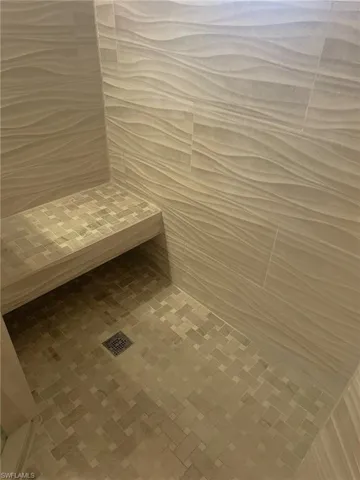 Fully remodeled primary bath offers a spa tub in this waterfront condo with new air conditioner, hot water heater, appliances, baths, and flooring is ready for you. Prentiss Pointe Condo for sale in Fort Myers Florida