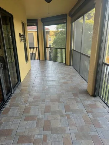 Wrap-around lanai offers the premier view of the lake fountain with turtles and birds to entertain while protected by Storm Smart security screens. Prentiss Pointe Condo for sale in Fort Myers Florida