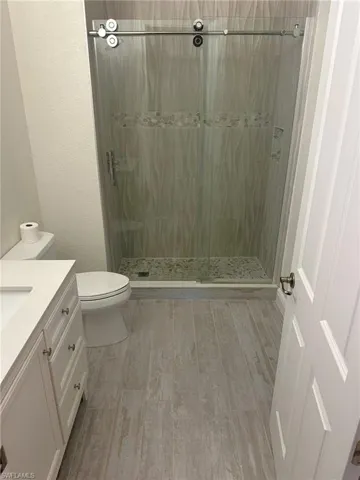 Fully remodeled bath offers a spa shower in this waterfront condo with new air conditioner, hot water heater, appliances, baths, and flooring is ready for you. Prentiss Pointe Condo for sale in Fort Myers Florida