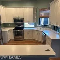 Kitchen offers new high-end appliances and new tile flooring. Prentiss Pointe Condo for sale in Fort Myers Florida