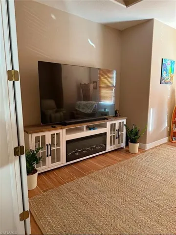 Large den with double doors adds a private area for an office, media room, hobby area, or addition entertaining space. Prentiss Pointe Condo for sale in Fort Myers Florida