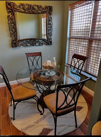 Snuggle in and enjoy your coffee here or on the gorgeous wrap around waterfront lanai. Prentiss Pointe Condo for sale in Fort Myers Florida