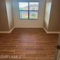 Large den with double doors adds a private area for an office, media room, hobby area, or addition entertaining space. Prentiss Pointe Condo for sale in Fort Myers Florida