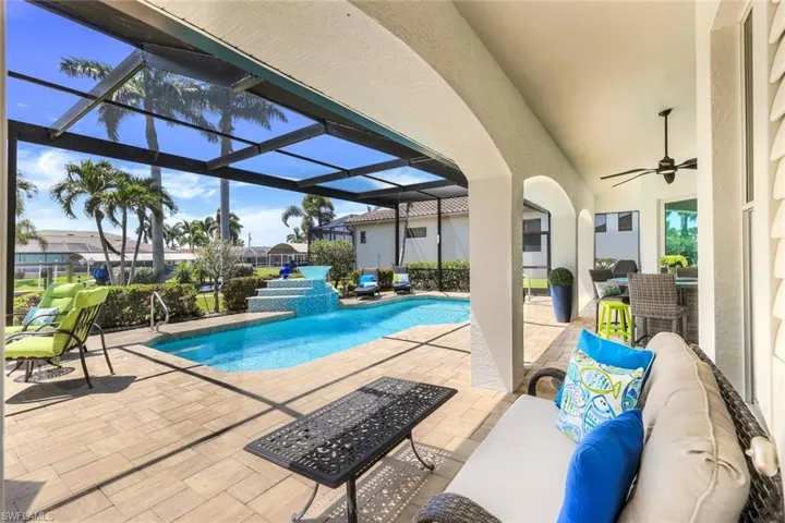 The private West facing pool deck with lavish grounds