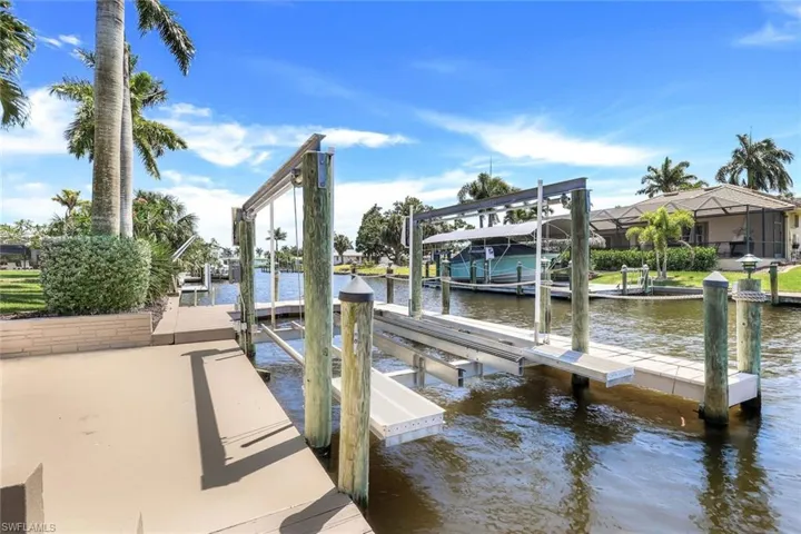 The private boat dock has electric + water at the dock