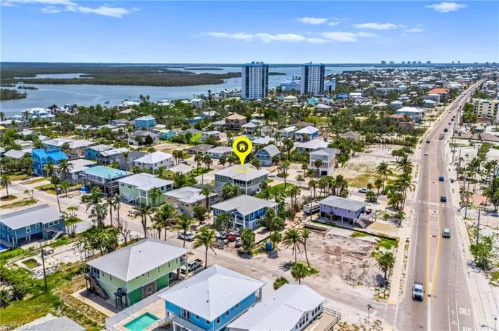 Bird's eye view with a water view and a view of city - VIRTUAL EDITED EXTERIOR IMAGE