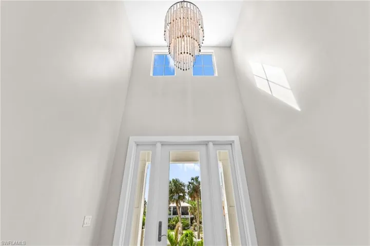 Room details with a chandelier. virtually edited photo