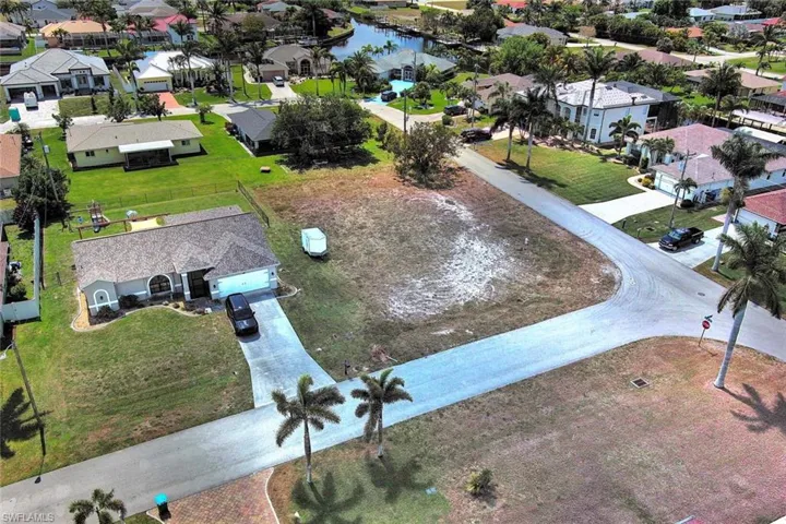 Aerial view of residential area with a large body of water