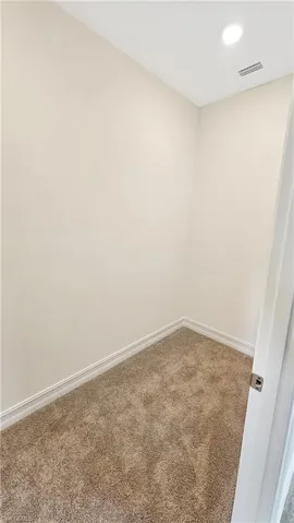 Spare room with carpet flooring