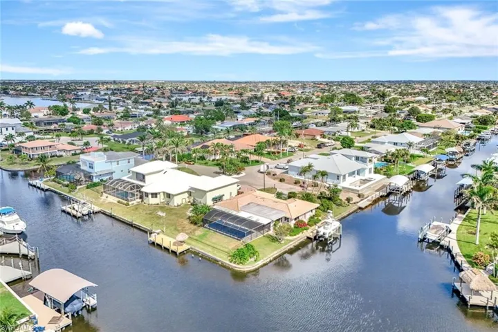 Bird's eye view featuring a water view and a residential view