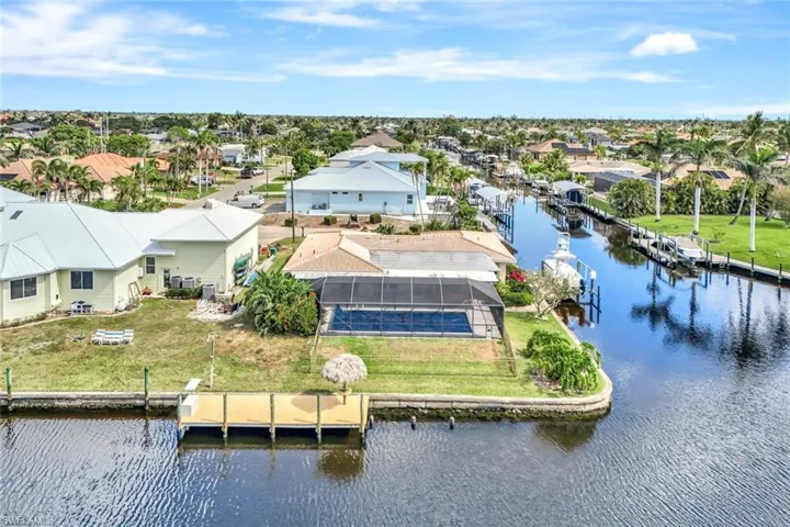 Aerial view with a residential view and a water view