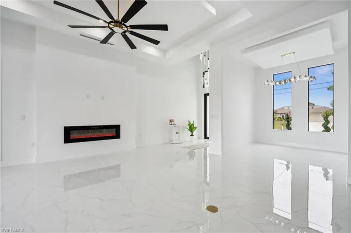 Living Room view to front entry and dining area