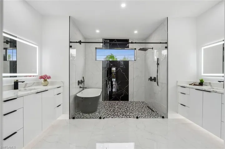 Primary / Master Bathroom ~ Dual Sinks~ Tub and Large Shower