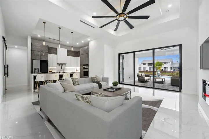 Living Room looking toward pool *Virtually Staged*