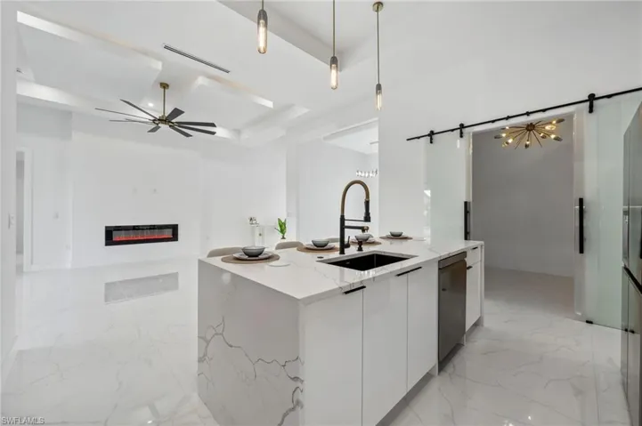Kitchen with view of the office and living room