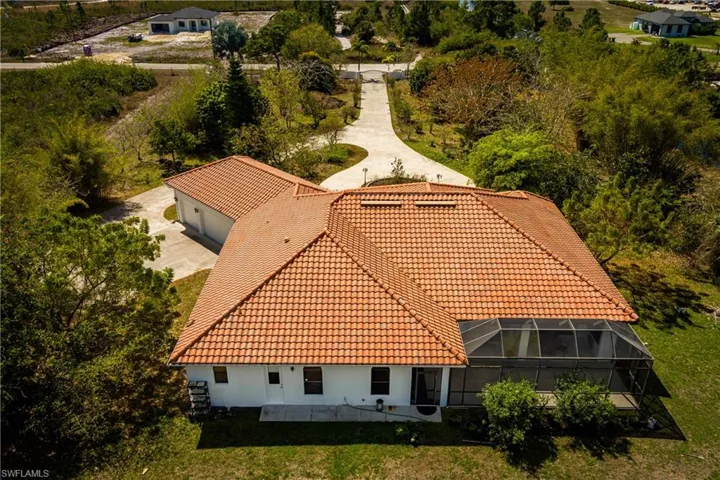 Aerial view of property and surrounding area