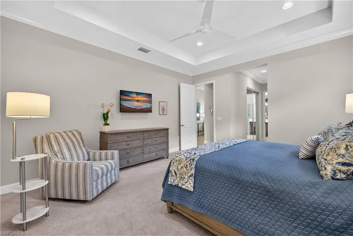 Located just of the foyer, the primary bedroom is spacious and welcoming. See the mirrored 2nd closet?
