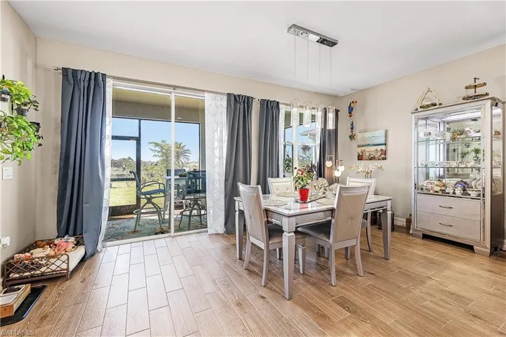 Dining space featuring wood finish floors